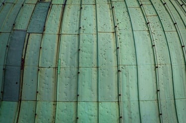 what metals turn green - copper patina effect on roof