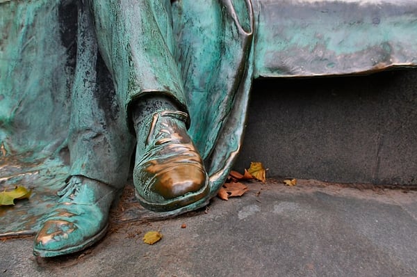 green metal - patina effect on statue